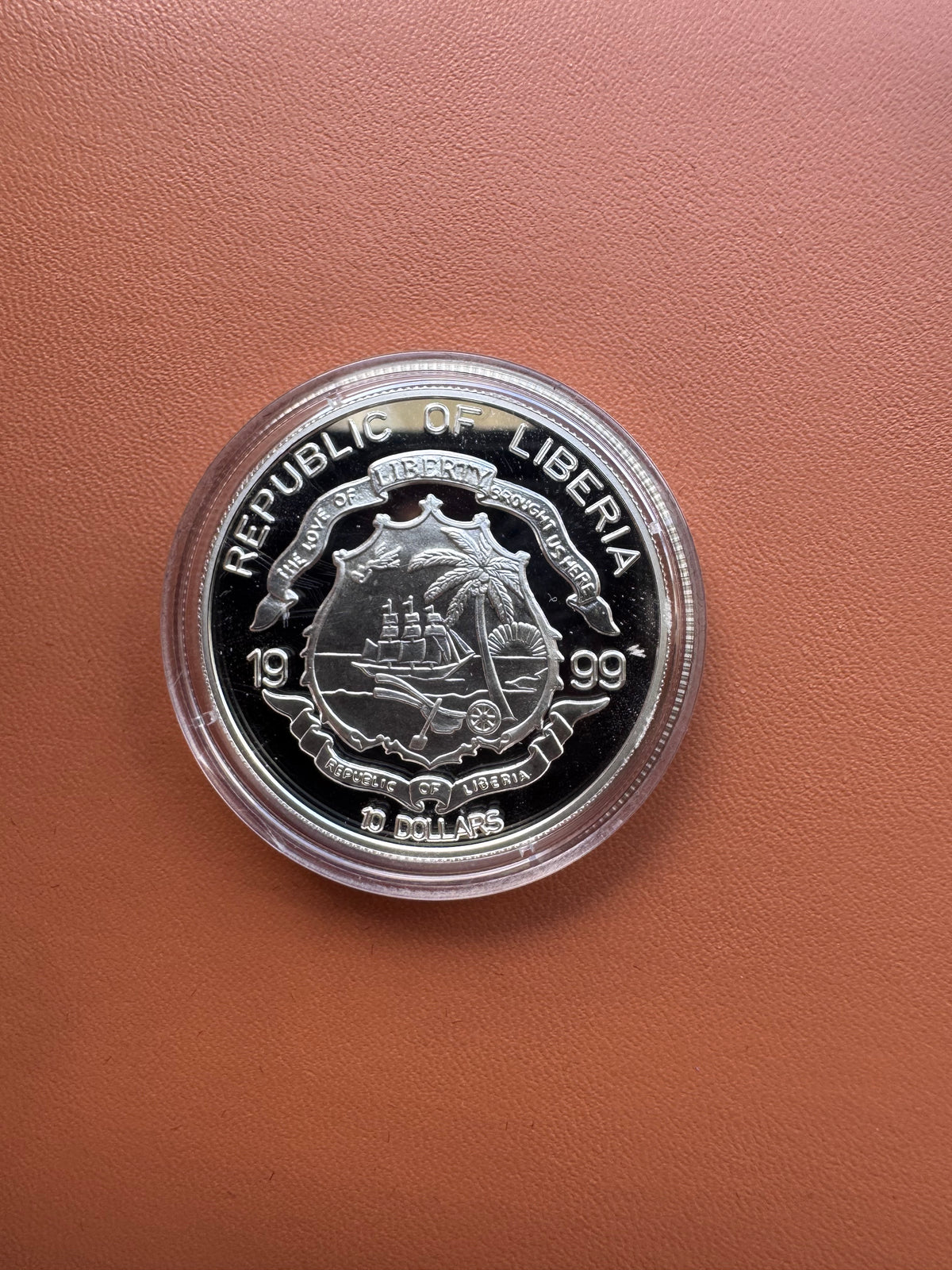 Awers – Republic of Liberia 1999, herb, The Love of Liberty Brought Us Here, 10 Dollars